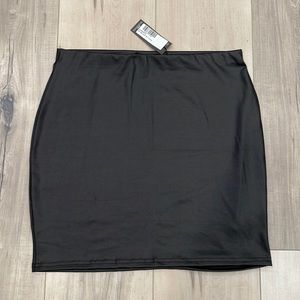 NWT PrettyLittleThing black pleather skirt, size 10.